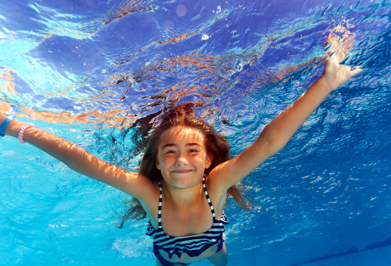 Little girl enjoying pool