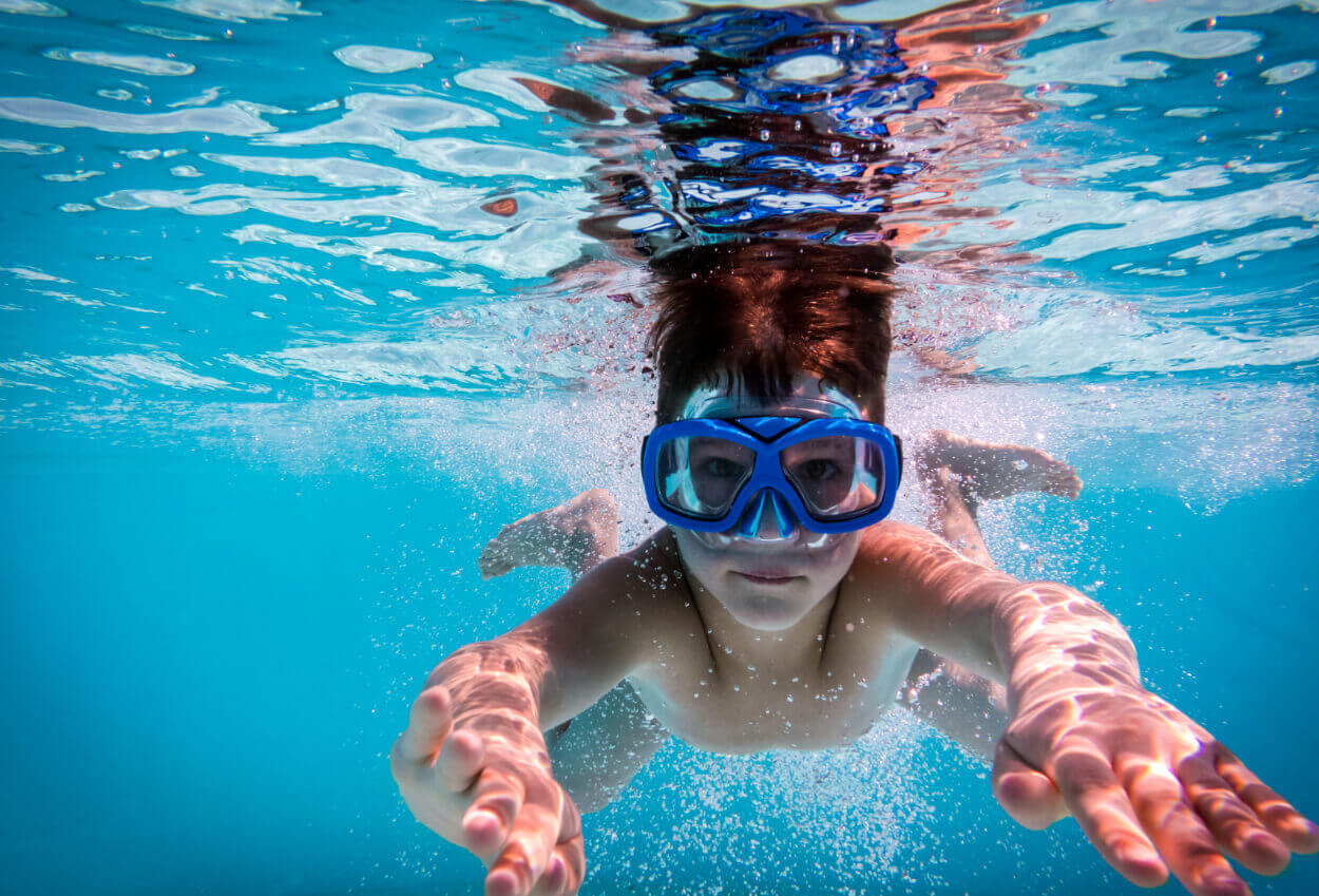 Boy wearing a scuba mask